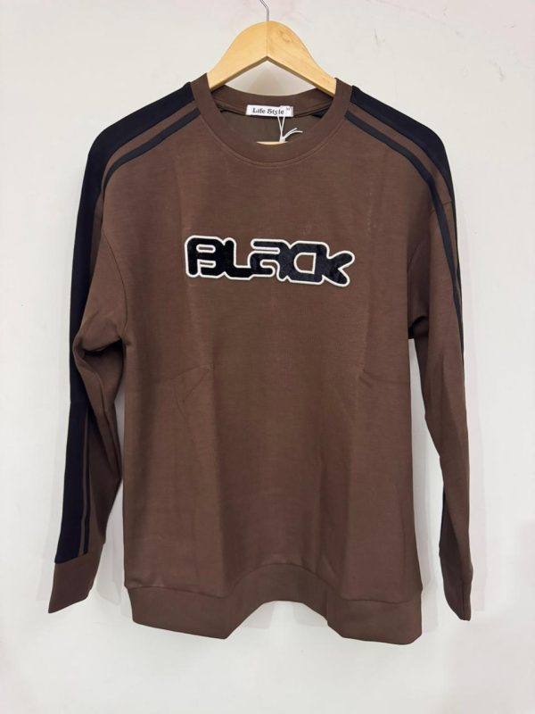 Brown long-sleeve sweatshirt with "BLACK"